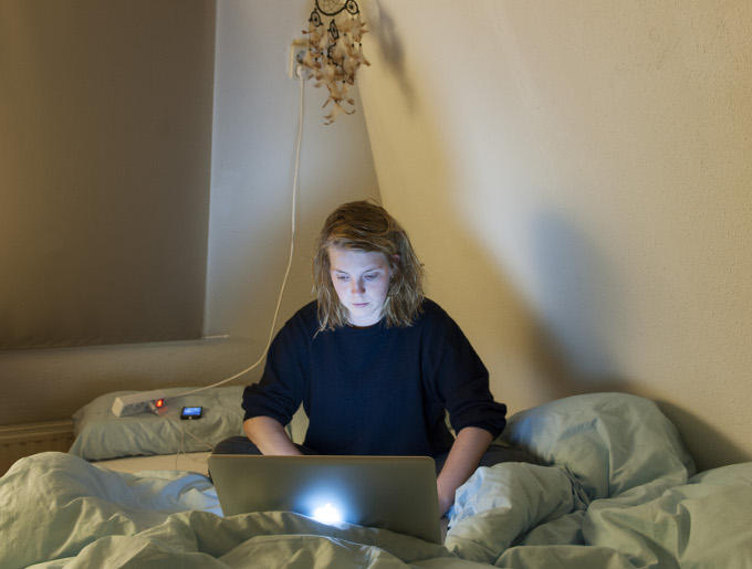 Evita Hinneman, fotograaf. Voor de foto’s moet je op pad, maar de rest kan digitaal thuis, zelfs in bed